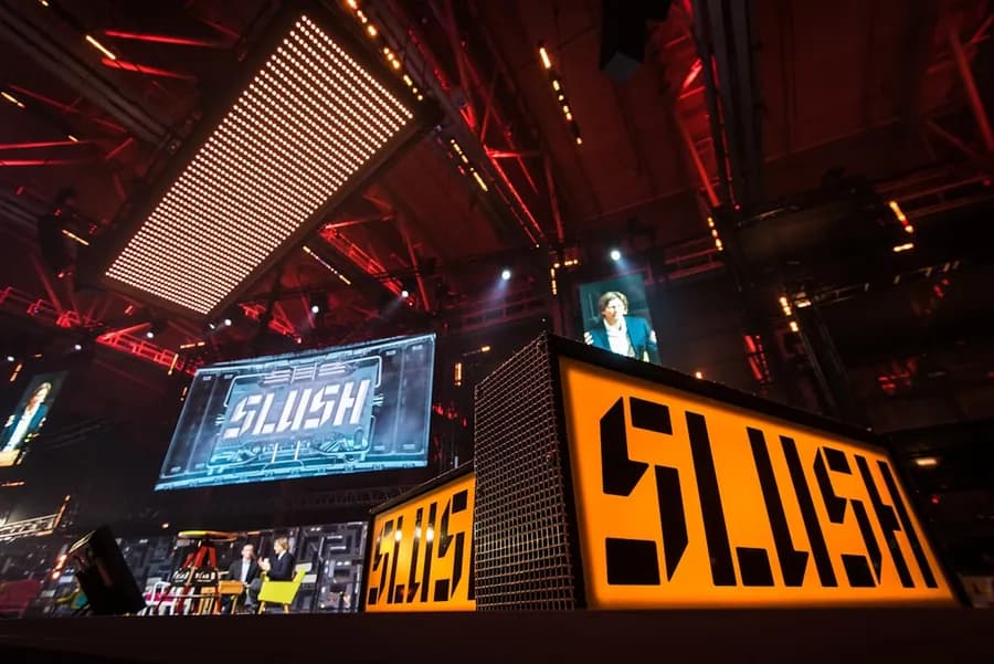 A speaker on stage at a technology conference